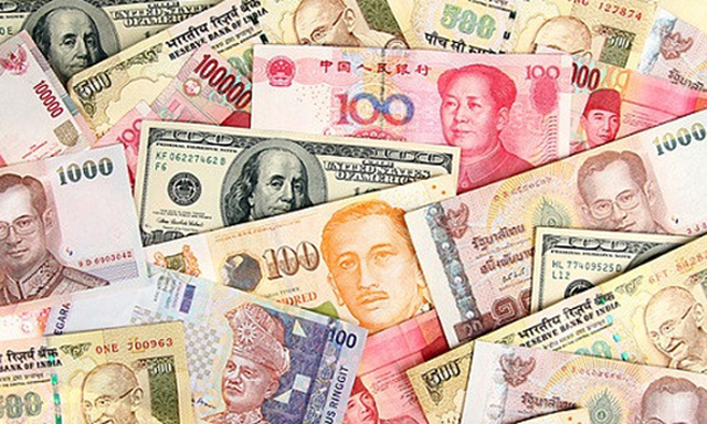 Tổng thống Mỹ cáo buộc Nga và Trung Quốc phá giá đồng tiền