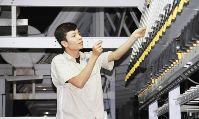 Hoạt động sản xuất tại Nhà máy Xơ sợi Đình Vũ