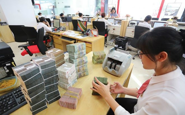 Các tổ chức tín dụng phải kiểm soát tốc độ tăng trưởng tín dụng theo chỉ tiêu tăng trưởng tín dụng năm 2018 (Ảnh minh họa: Internet)