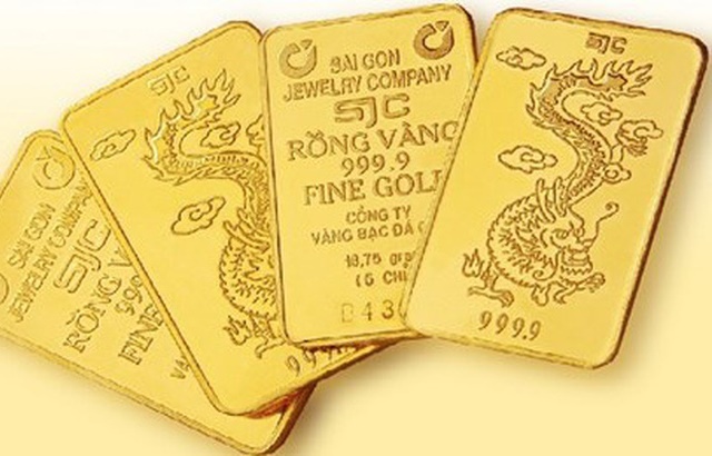 Giá vàng thế giới tạm thời lui bước do đồng USD tăng vọt