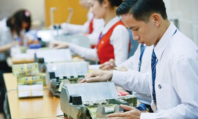 Nhiều ý kiến cho rằng cần dỡ bỏ trần lãi suất huy động