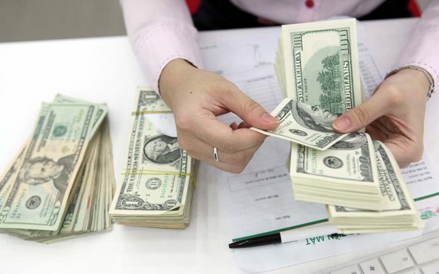 Ngân hàng giảm giá USD (Ảnh: Internet)