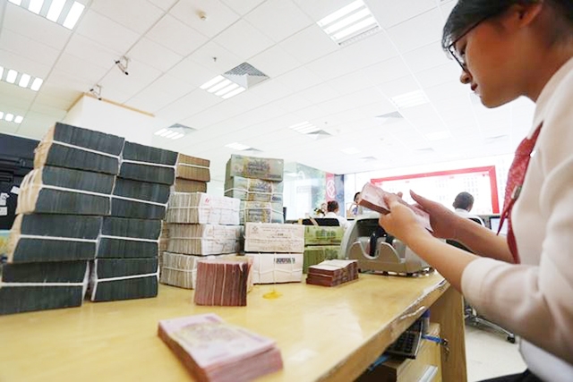 Tỷ lệ vốn ngắn hạn cho vay trung và dài hạn dần được siết chặt