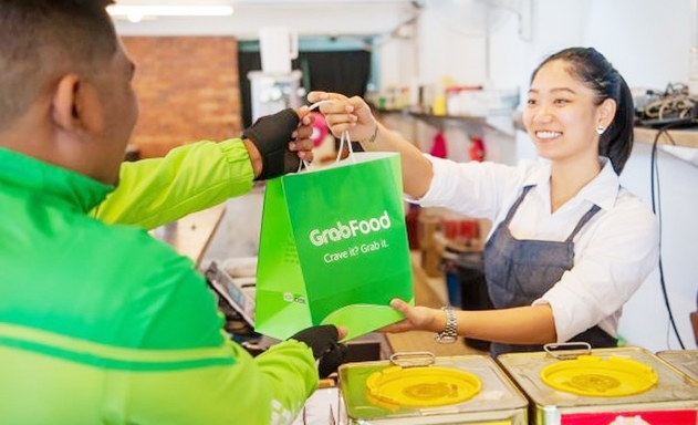 Cuộc đua chiếm lĩnh thị phần dịch vụ đồ ăn trực tuyến ngày càng khốc liệt