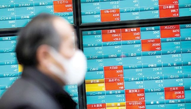 Chứng khoán Trung Quốc đại lục đảo chiều và sụt giảm so với những giờ giao dịch trước đó (Ảnh Internet)