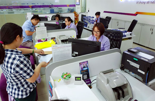 Ngành ngân hàng bị ảnh hưởng nặng nề nếu dịch kéo dài (Ảnh minh hoạ: Internet)