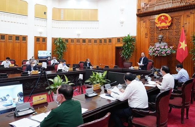 Thủ tướng chủ trì họp Thường trực Chính phủ bàn các giải pháp mới chống dịch COVID-19 (Ảnh Internet)