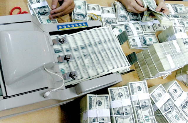 Từ đầu năm đến nay, Ngân hàng Nhà nước đã mua được 3 tỷ USD vào dữ trữ ngoại hối (Ảnh minh hoạ: Internet)