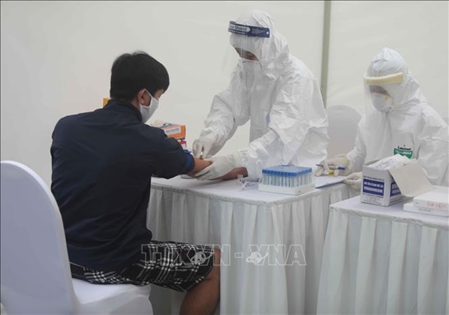 Dalia Research: Chính phủ Việt Nam đạt tín nhiệm trong ứng phó COVID-19 cao nhất thế giới (Ảnh TTXVN)