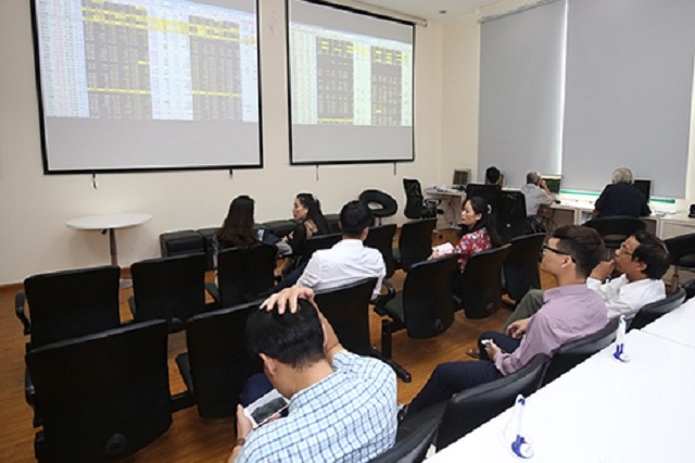 Lợi nhuận ròng của các doanh nghiệp niêm yết giảm 14,4% trong quý II