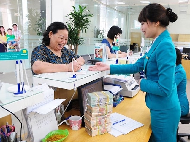 Giao dịch tại ngân hàng (Ảnh Int)