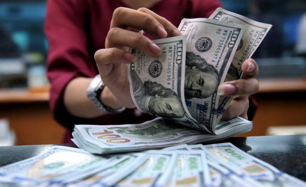 Đồng USD trên thị trường thế giới ít biến động, có xu hướng ngưng không giảm tiếp (Ảnh: Int)