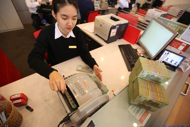 Tăng trưởng tín dụng ngành ngân hàng tính đến 21/12/2020 tăng 10,14% so với cuối năm 2019. (Ảnh: Int)