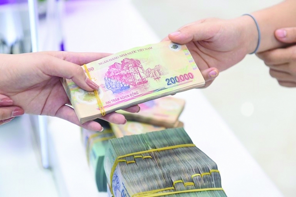 Năm 2021, NHNN đặt mục tiêu tăng trưởng tín dụng khoảng 12% và sẽ được điều chỉnh phù hợp với diễn biến, tình hình thực tế. (Ảnh minh hoạ: Int)