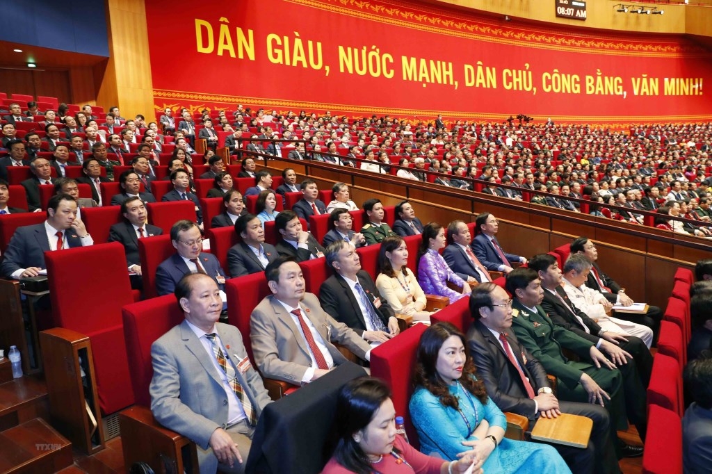 Đại biểu dự phiên thảo luận các văn kiện đại hội tại hội trường sáng 28/1.