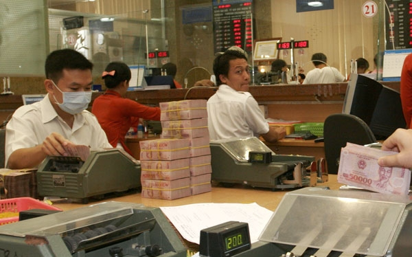 Gần đây doanh nghiệp bất động sản tăng mua cổ phần ngân hàng. (Ảnh minh hoạ: Int)