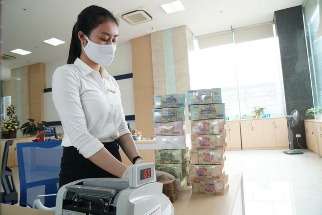 Lãi suất huy động tại các nhà băng và trên thị trường liên ngân hàng đang ở mức thấp nhất trong nhiều năm. (Ảnh minh hoạ: Int)