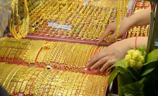 Giá vàng trong nước cao hơn giá vàng thế giới 5,87 triệu đồng/lượng. (Ảnh: Int)