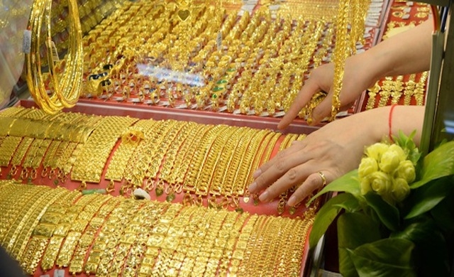 Giá vàng trong nước cao hơn giá vàng thế giới 5,87 triệu đồng/lượng. (Ảnh: Int)