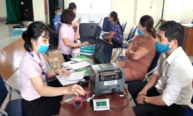 Từ ngày 19/5, khách hàng vay vốn bị tuyên bố phá sản hoặc giải thể sẽ được xoá nợ tại Ngân hàng Chính sách xã hội. (Ảnh minh hoạ: Int)