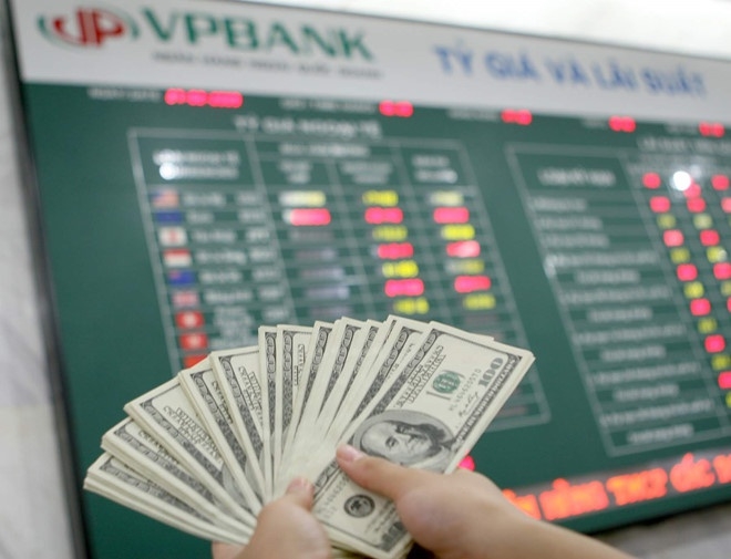 Tỷ giá USD/VND ở một số ngân hàng phổ biến ở quanh mức: 22.945 đồng/USD và 23.145 đồng/USD. (Ảnh: Int)