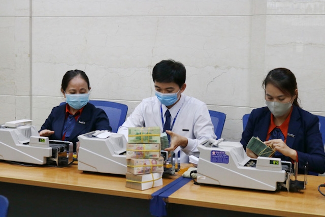 Một số ngân hàng đã công bố cụ thể phương án giảm lãi suất cho vay. (Ảnh: Int)