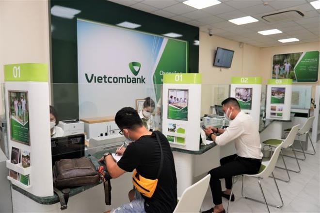 Lợi nhuận quý II của Vietcombank giảm 14,3% so với cùng kỳ, chỉ còn 4.938 tỷ đồng.