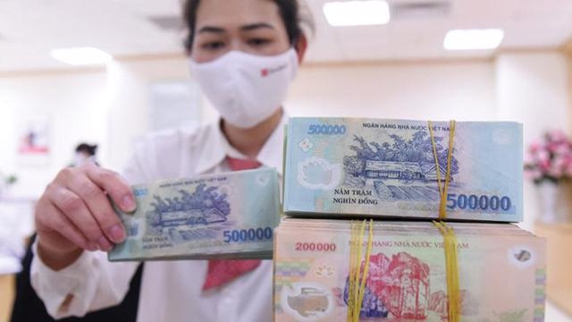 Hiệp hội Ngân hàng kiến nghị, khách hàng có khoản nợ đáo hạn trong thời gian phong tỏa, thời gian đáo hạn sẽ được dời sang sau thời gian phong tỏa. (Ảnh TL).