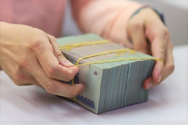 Mặt bằng lãi suất cho vay giảm 1,55%/năm so với trước dịch. (Ảnh minh hoạ: Int)