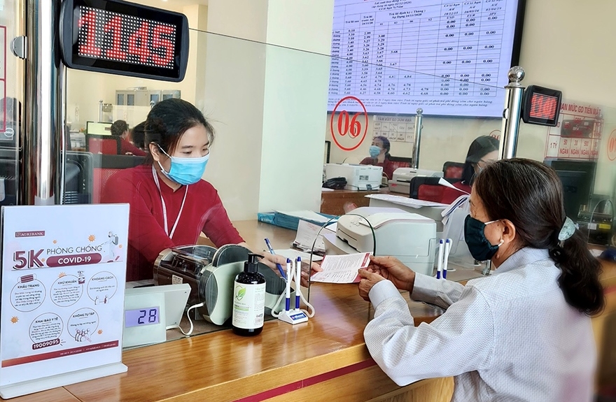 Đến ngày 26/7/2021, các TCTD đã cơ cấu lại thời hạn trả nợ cho 198.638 khách hàng với dư nợ 309.147 tỷ đồng. (Ảnh: Int)