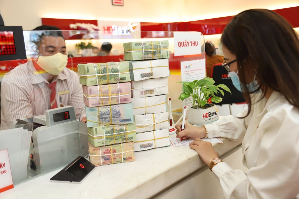 Sắp có gói hỗ trợ lãi suất trên 100.000 tỷ đồng cứu doanh nghiệp ảnh hưởng COVID-19. (Ảnh: Int)