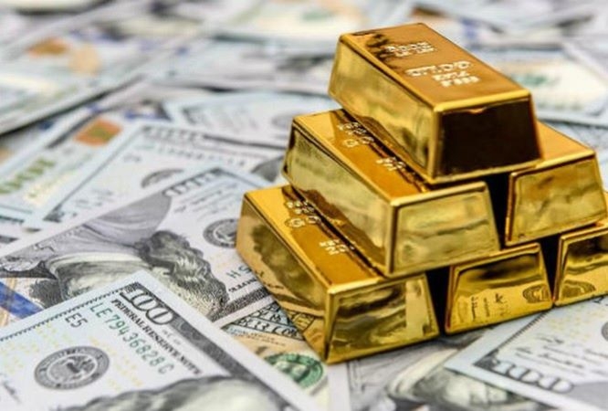 Tỷ giá đồng USD có sự hồi phục nhưng giá vàng thế giới vẫn tăng nhẹ . (Ảnh: Int)