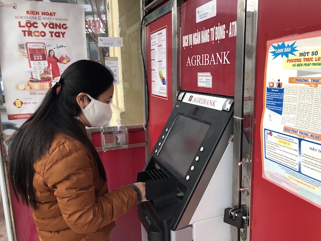 Nhu cầu rút tiền từ máy ATM dịp Tết năm nay tăng không đáng kể so với ngày thường.