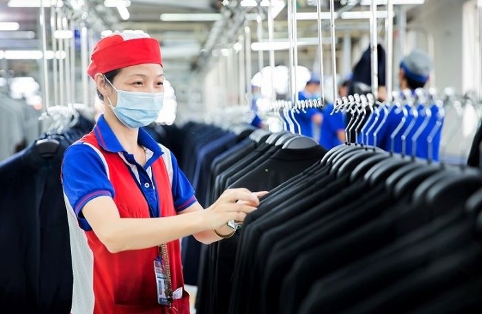 Sau khi bị sụt giảm trong năm 2020, xuất khẩu dệt may sang thị trường Canada năm 2021 đạt tới 935 triệu USD, tăng gần 18% (Ảnh: TL)