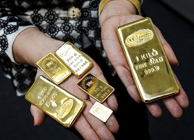 Chênh lệch giá vàng trong nước và thế giới vẫn giữ trên 14 triệu đồng/lượng. (Ảnh: Int)