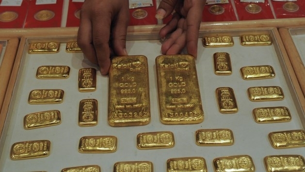 Chênh lệch giá vàng trong nước và thế giới gần 15 triệu đồng/lượng. (Ảnh: Int)