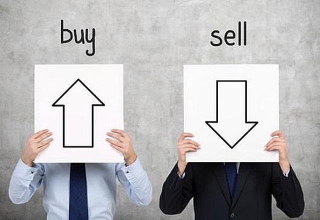 Lãnh đạo và người thân doanh nghiệp bất động sản nhộn nhịp mua bán cổ phiếu. (Ảnh minh họa)