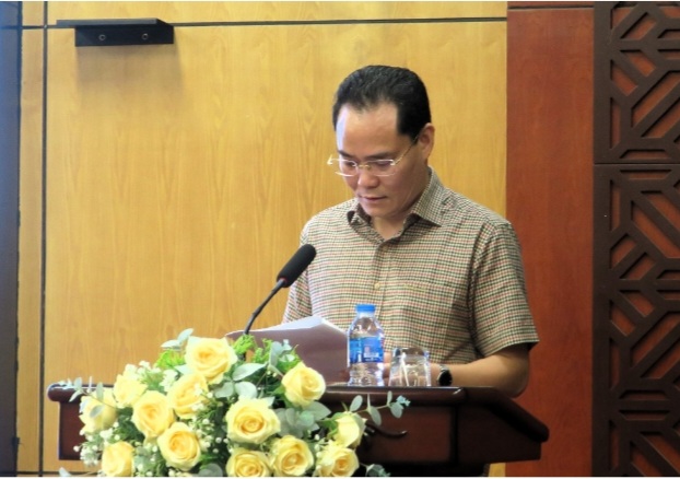 Ông Bùi Minh Đức, giám đốc BHXH Hải Phòng báo cáo tại Hội nghị.