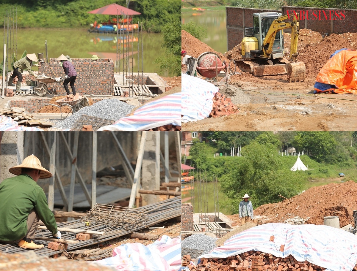 Công nhân thi công xây dựng tại khu vực ven hồ Đồng Đò.