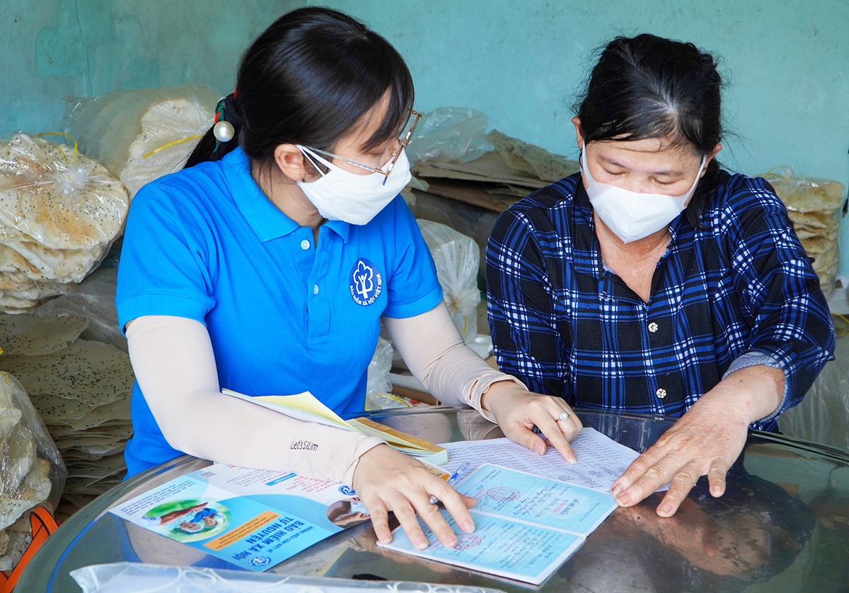 Hàng triệu lao động tự do đang hưởng lợi ích từ chế độ BHXH tự nguyện, BHYT hộ gia đình &lpar;Ảnh: Thanh Dũng&rpar;.