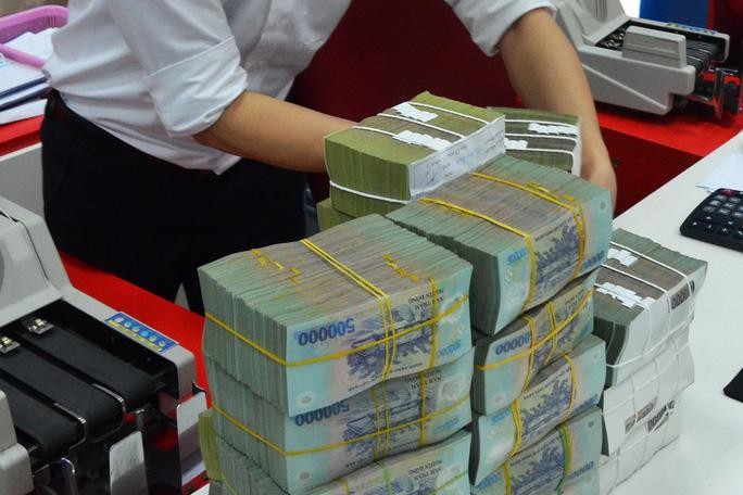 Nhiều doanh nghiệp loay hoay xoay xở trả nợ bằng cách bán bớt dự án bất động sản, thậm chí đóng cửa công ty con. &lpar;Hình minh họa&rpar;