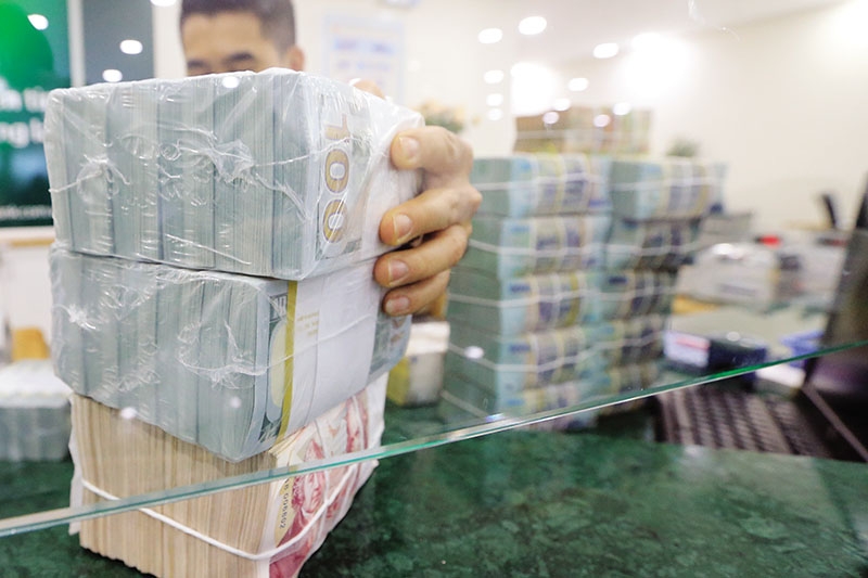 Nhiều ngân hàng tăng tốc thu hồi công nợ và xử lý nợ xấu.