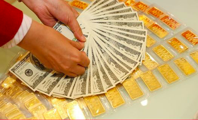 Giá vàng tăng nóng đã tác động mạnh đến tỷ giá USD/VND.