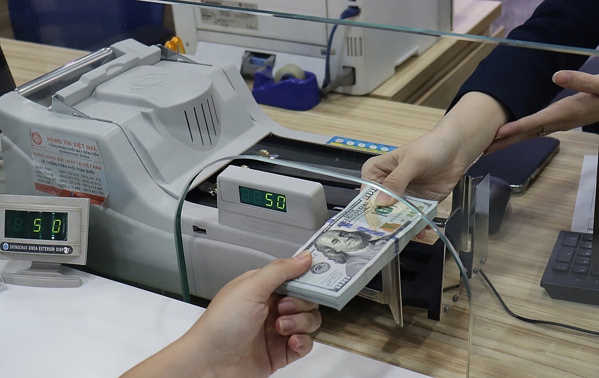 Ngân hàng Nhà nước yêu cầu tăng cường kiểm tra mua, bán USD trái phép &lpar;Ảnh minh họa&rpar;.