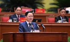 Ông Nguyễn Anh Tuấn, Ủy viên Trung ương Đảng, Phó Trưởng Ban Chính sách, chiến lược Trung ương trình bày tham luận tại Đại hội đại biểu toàn quốc lần thứ XIV của Đảng.