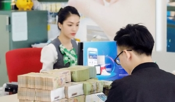 “Bầu sữa” tín dụng quá tải: 38,5 triệu tỷ đồng và giới hạn của ngân hàng