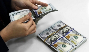 Nhập siêu kỷ lục, vì sao VND vẫn