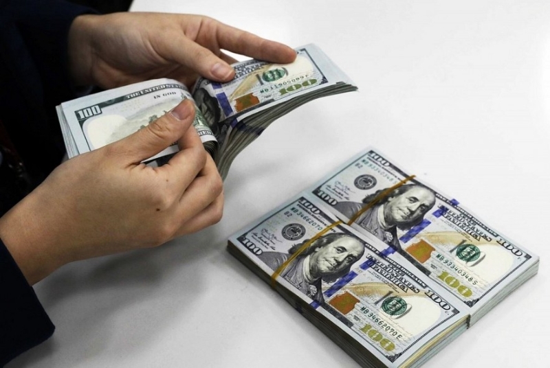 Nhập siêu kỷ lục, vì sao VND vẫn "đứng im" giữa "bão" tài chính toàn cầu?