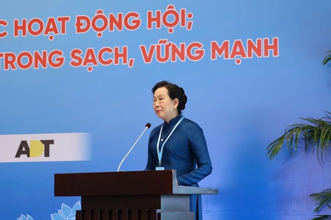 Bà Lê Thị Thủy - Ủy viên Trung ương Đảng, Phó Chủ tịch Ủy ban Trung ương Mặt trận Tổ quốc Việt Nam, Chủ tịch Hội Liên hiệp Phụ nữ Việt Nam chủ trì và phát biểu tại Trung tâm thảo luận số 1. Ảnh: Lê Phú