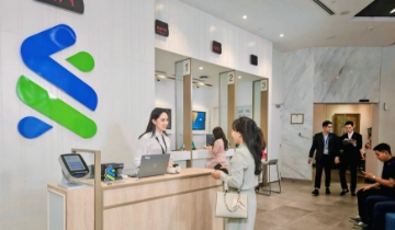 Standard Chartered nâng dự báo tăng trưởng GDP Việt Nam lên 9,5%